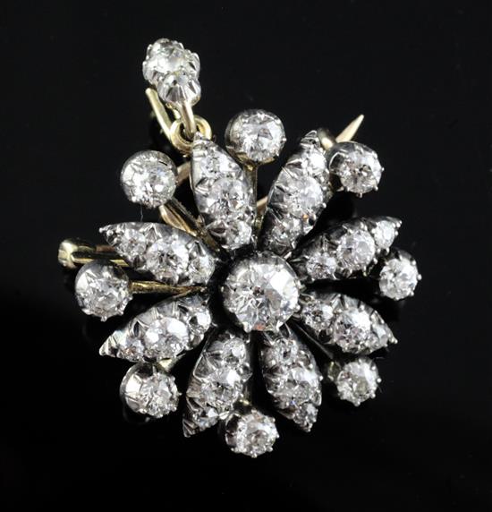 A Victorian gold, silver and diamond diamond flower head pendant brooch, 26mm.